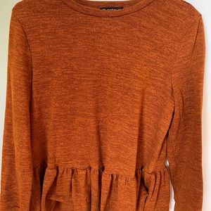 Burnt orange peplum top